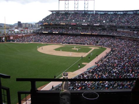 A ballpark loaded with fans ready to watch a baseball game from a few year ago
